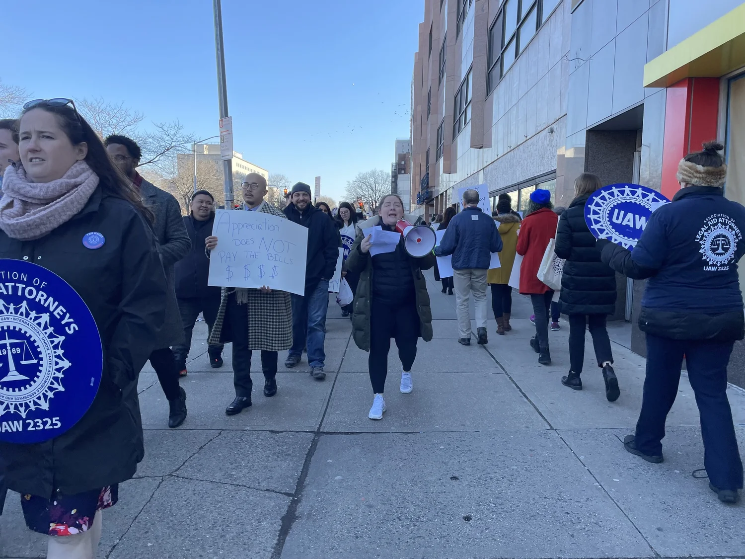 Queens public defenders walk out amid contract negations with Legal Aid ...