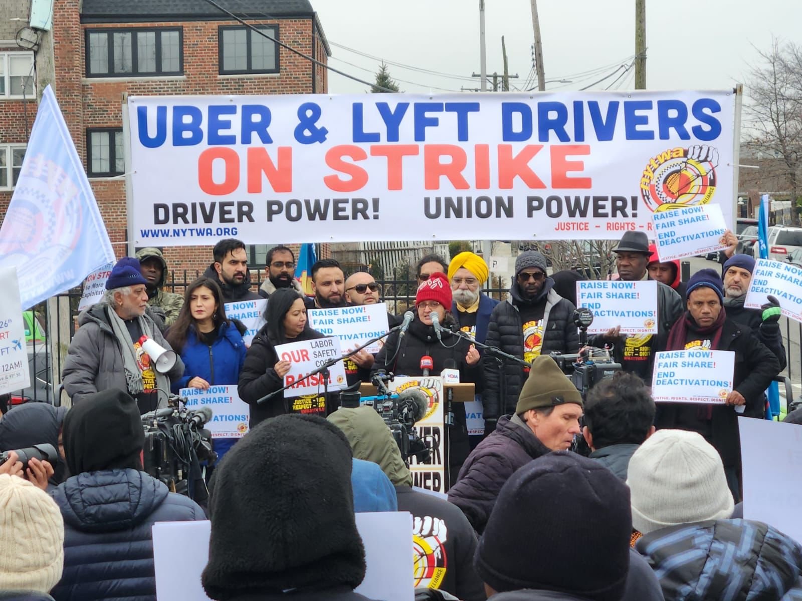 Uber and Lyft drivers strike outside LaGuardia for higher wages