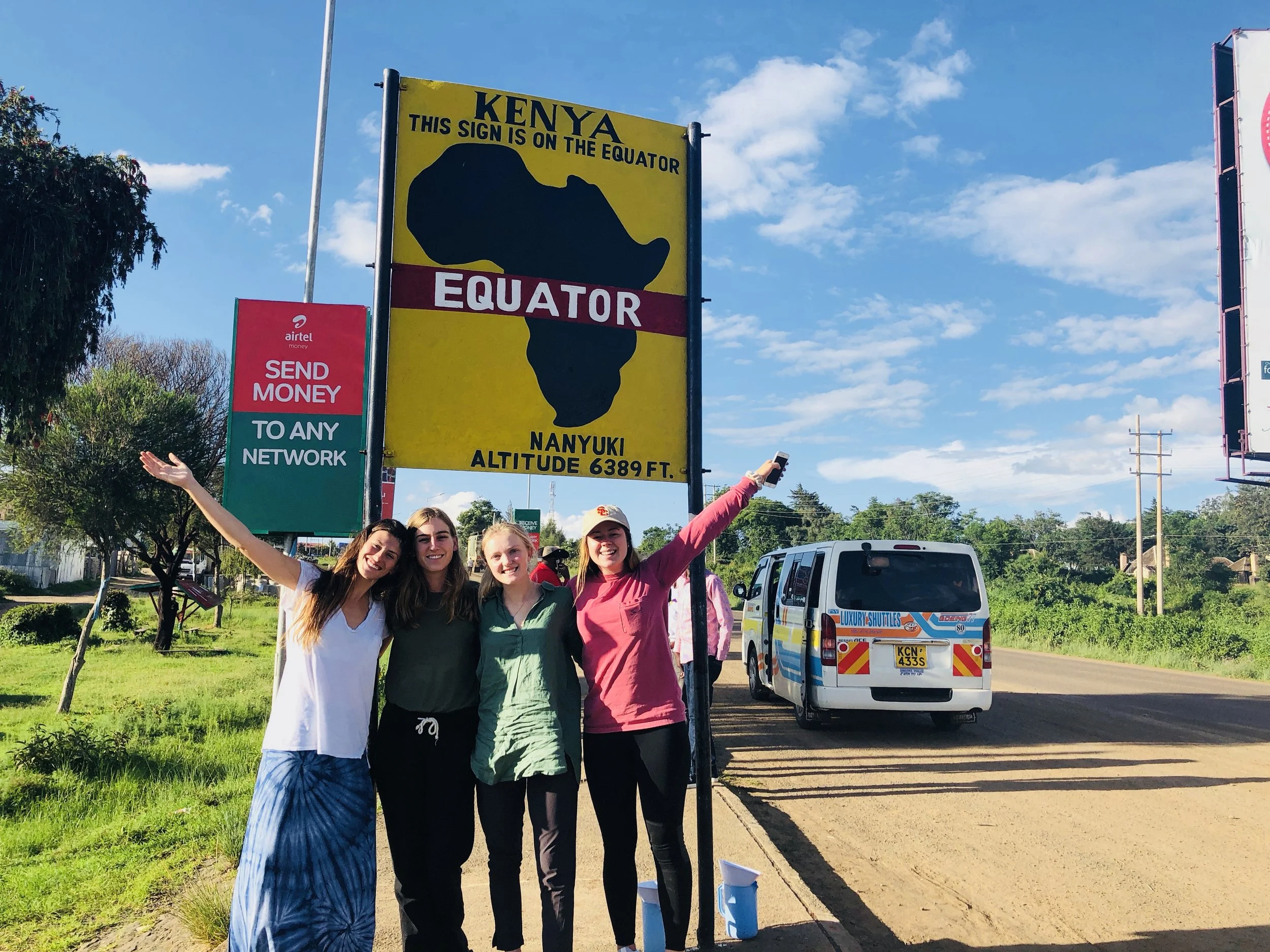 Students on the May 2018 Kenya project assessment trip crossing the equator.