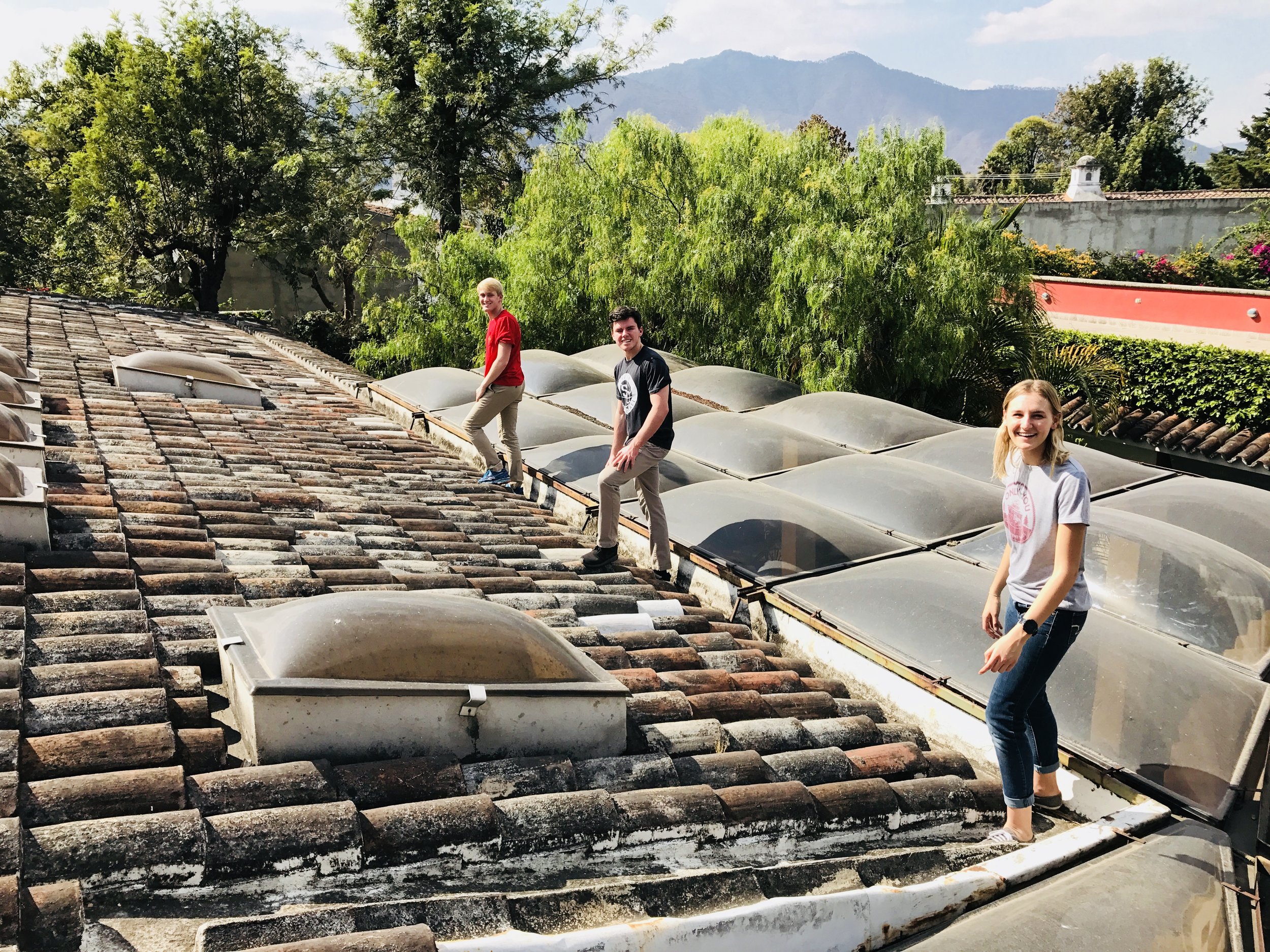 Taking roof measurements on the February 2018 assessment trip at the Common Hope campus. 