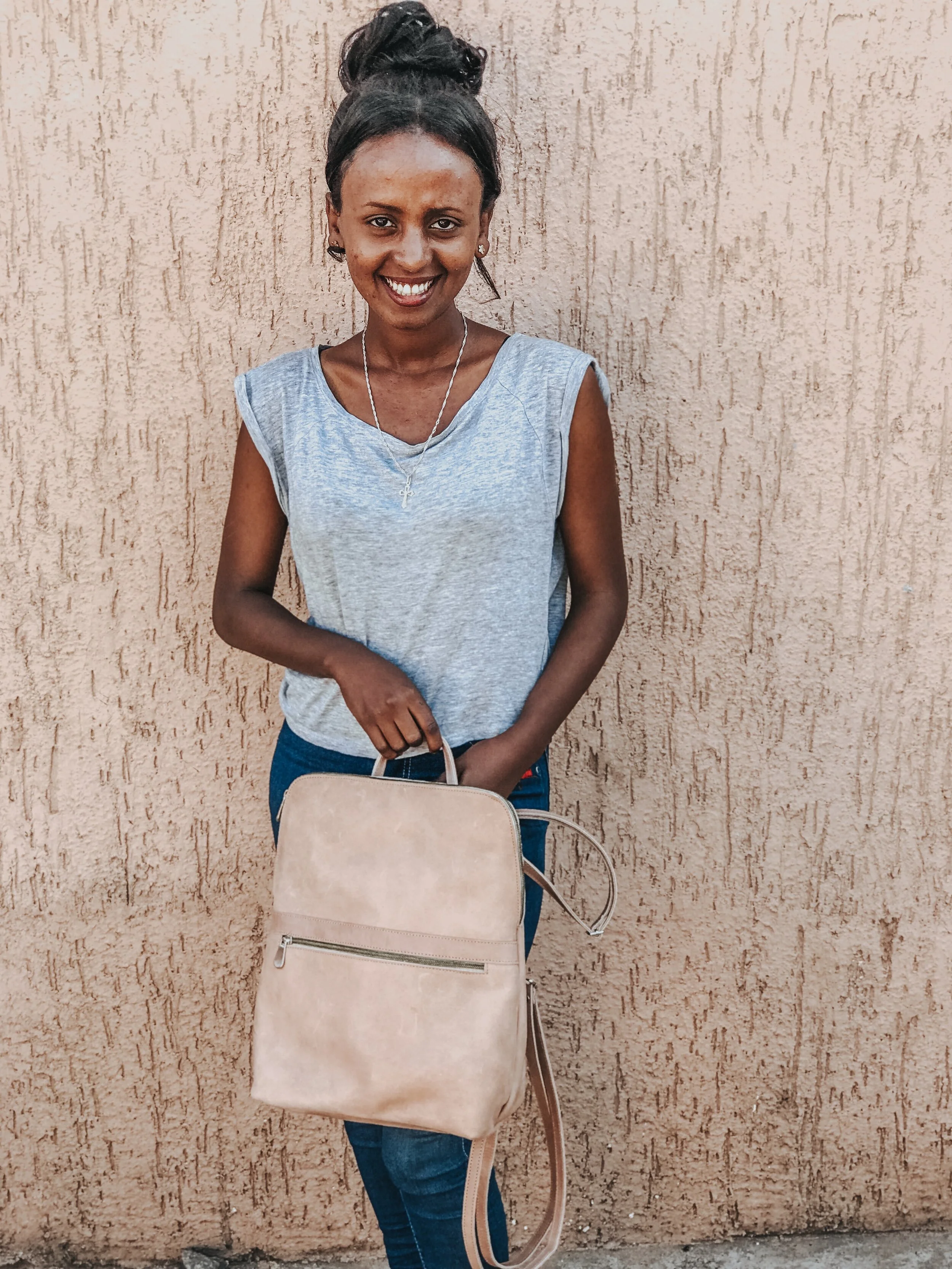 Habtam and her bag.jpg