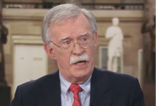 John Bolton admits planning coups d’etat ‘not here, you know, other places’ while discussing  January 6