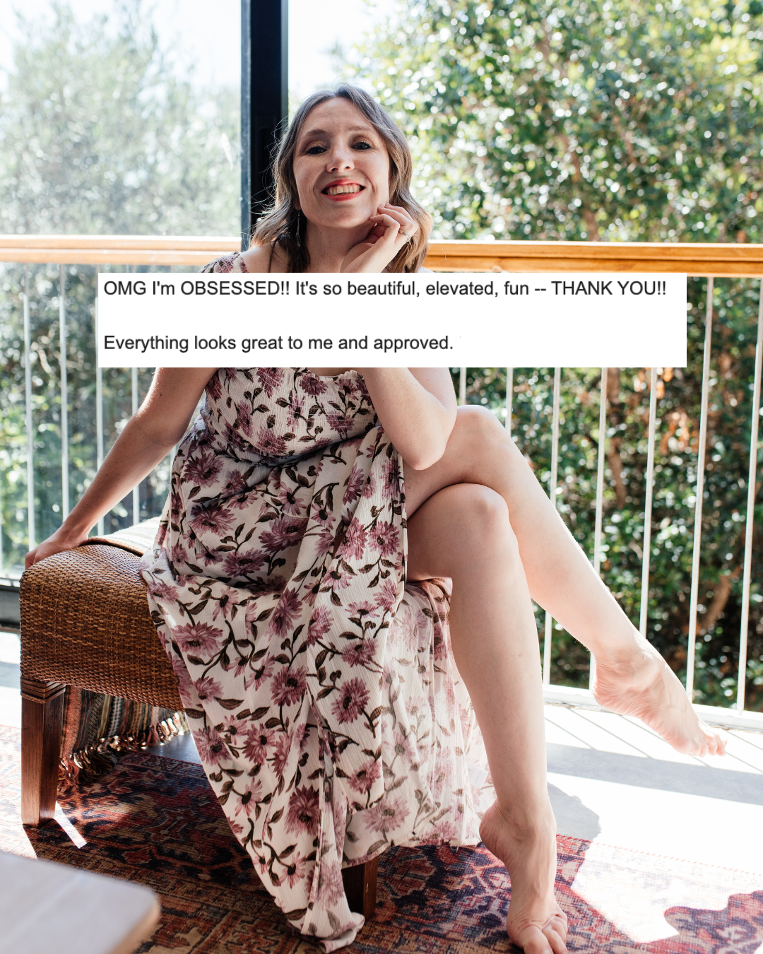A Social with shoulder-length hair smiling while sitting on a chair with one leg raised, wearing a floral dress, in a room with large windows and greenery outside. There is a caption overlay expressing excitement and satisfaction with her appearance.