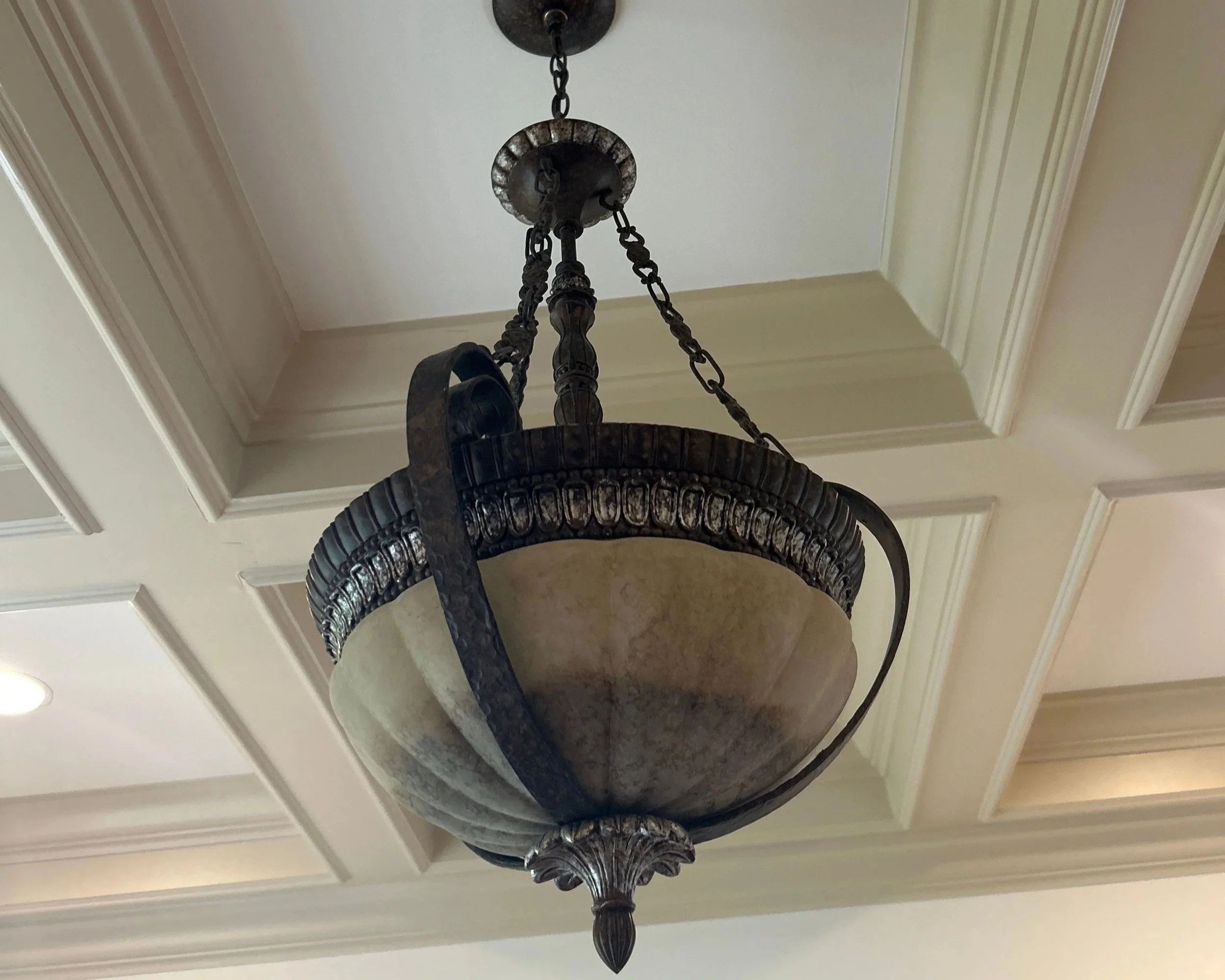 Water in den chandelier after bathtub overflow on the 2nd floor