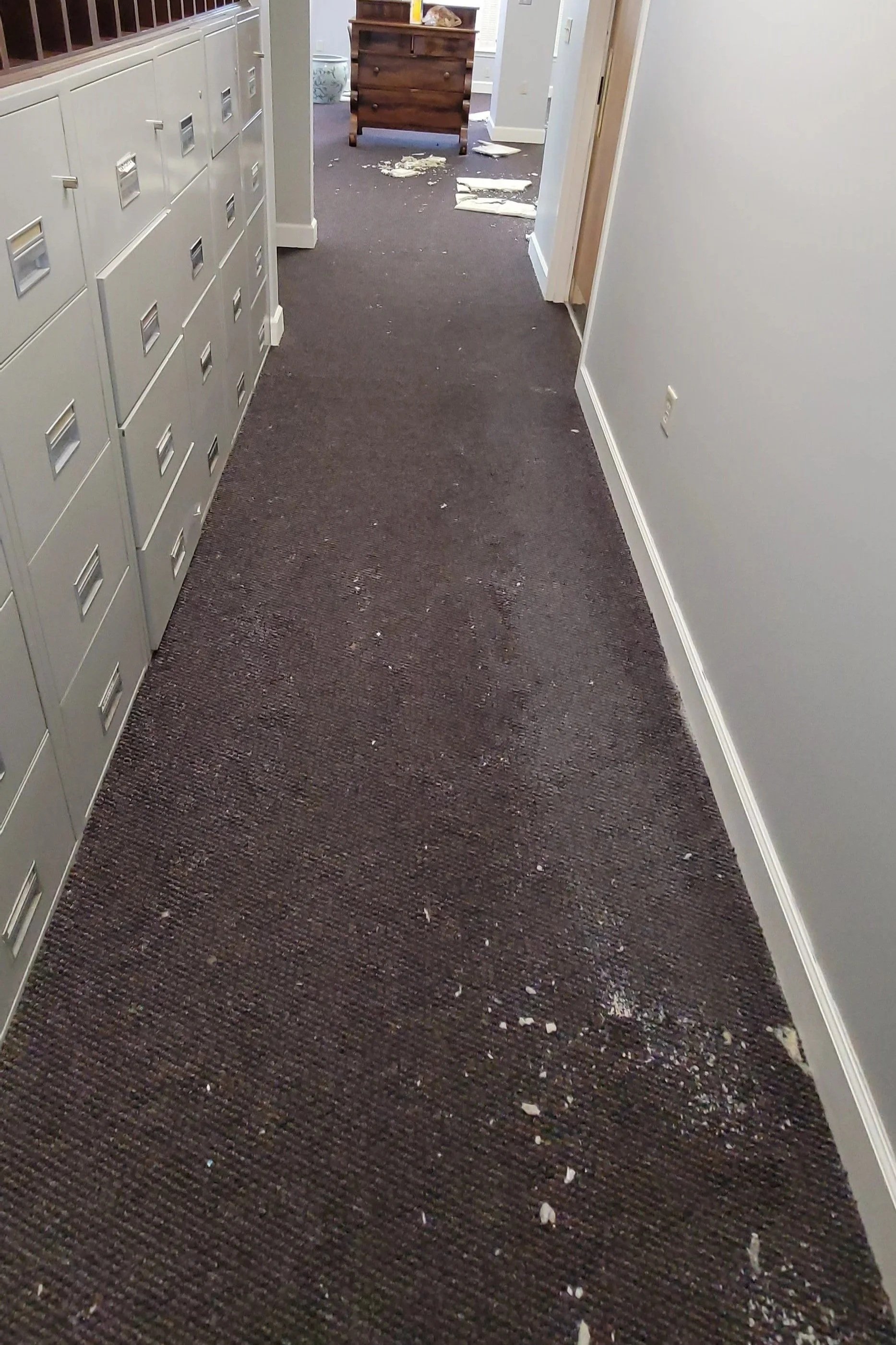 Damaged flooring in hallway 1