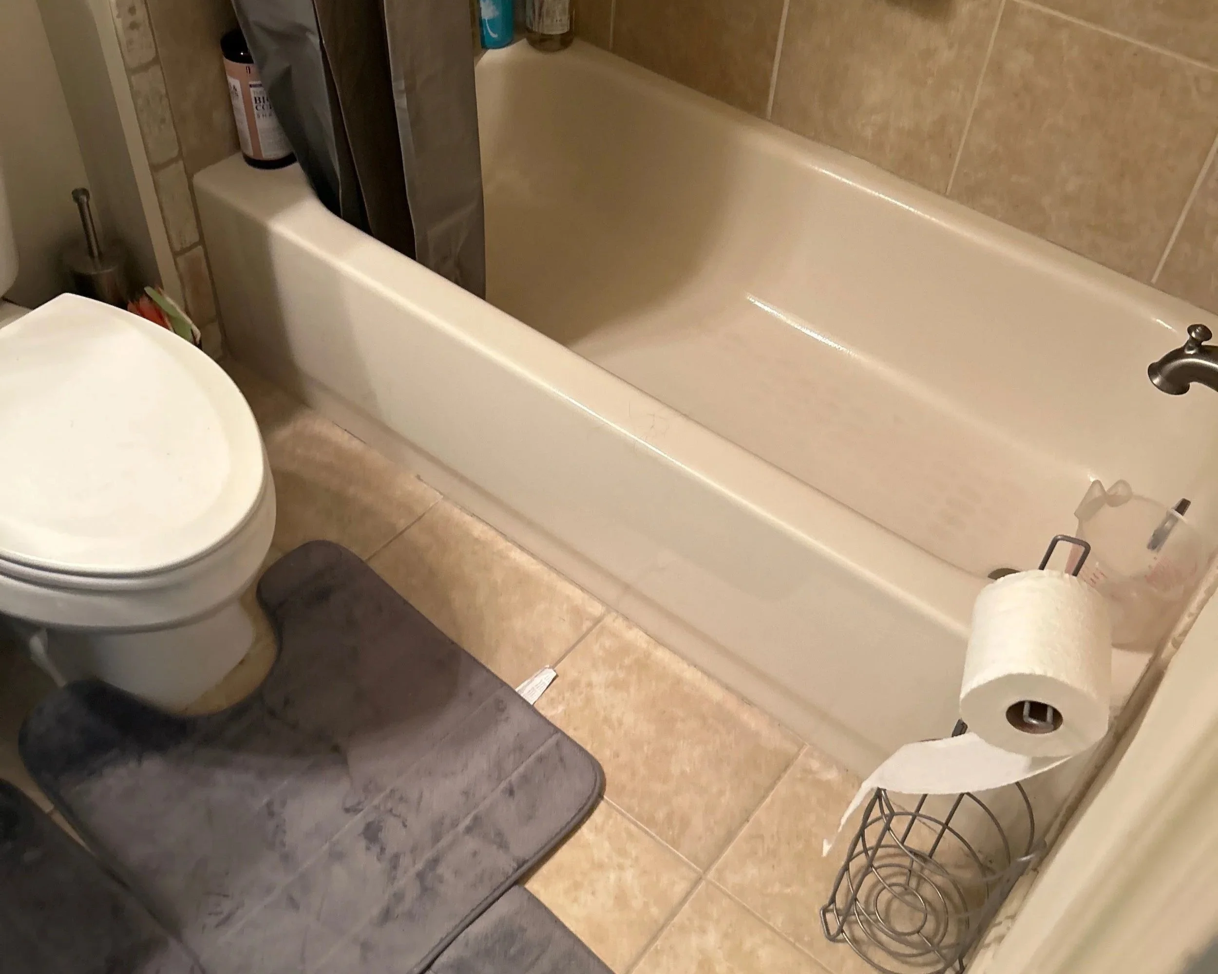 Bathroom where tub overflowed causing water damage to the home