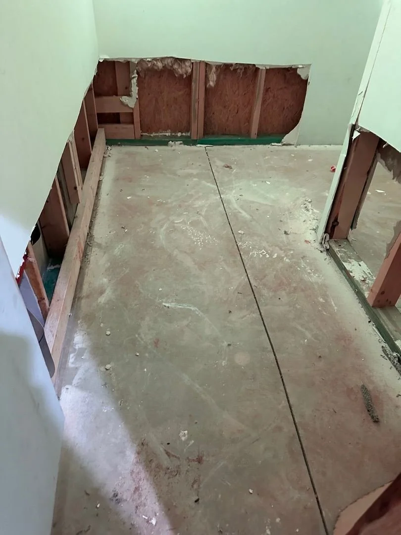 ServiceMaster mitigation removed carpet and wet drywall and dried out closet