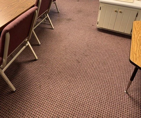 Classroom carpet stains before ServiceMaster cleaning