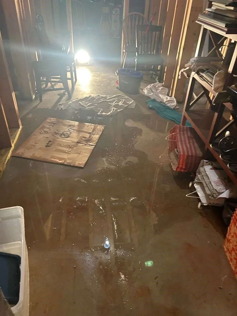 Water on floor of basement after water heater leak
