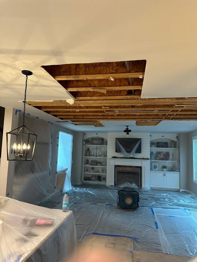 ServiceMaster covered built-in cabinets, counters and flooring before removal of drywall ceiling