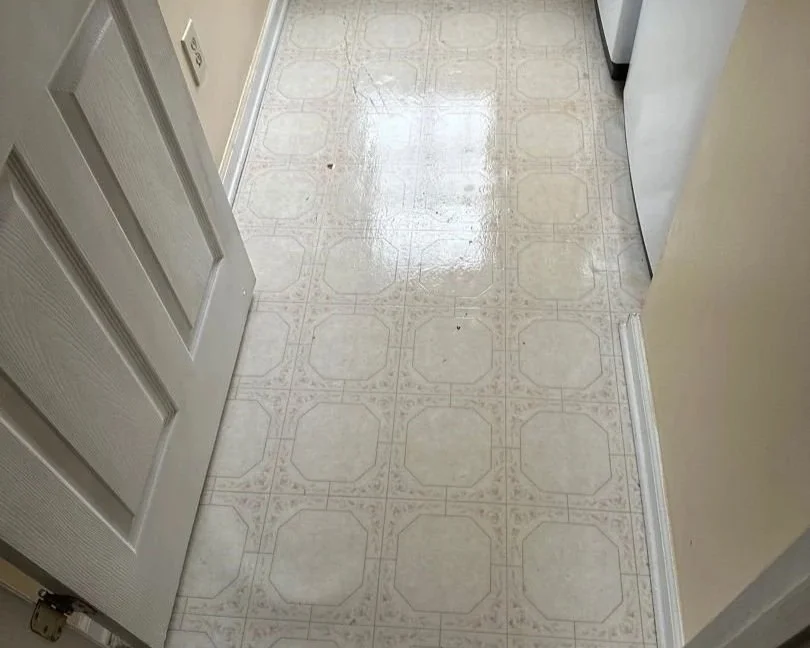 Laundry floor after ServiceMaster removed smoke and soot residue from a space heater fire