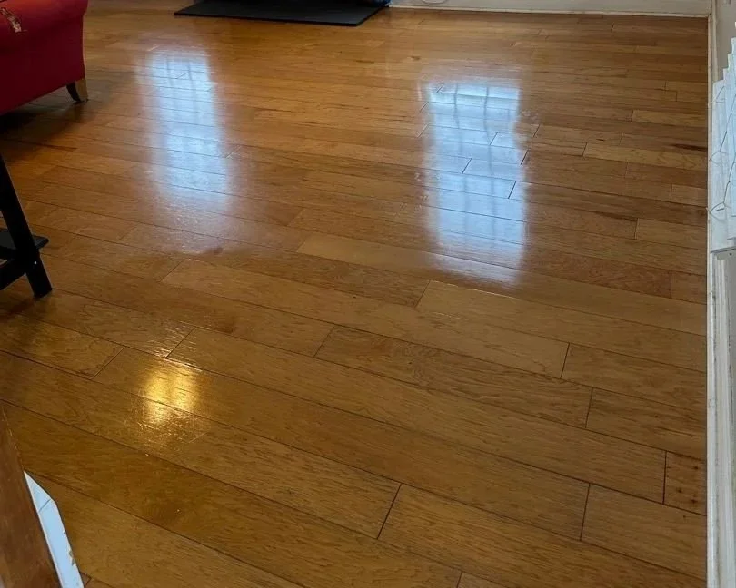 Living room hardwood flooring after ServiceMaster hardwood cleaning