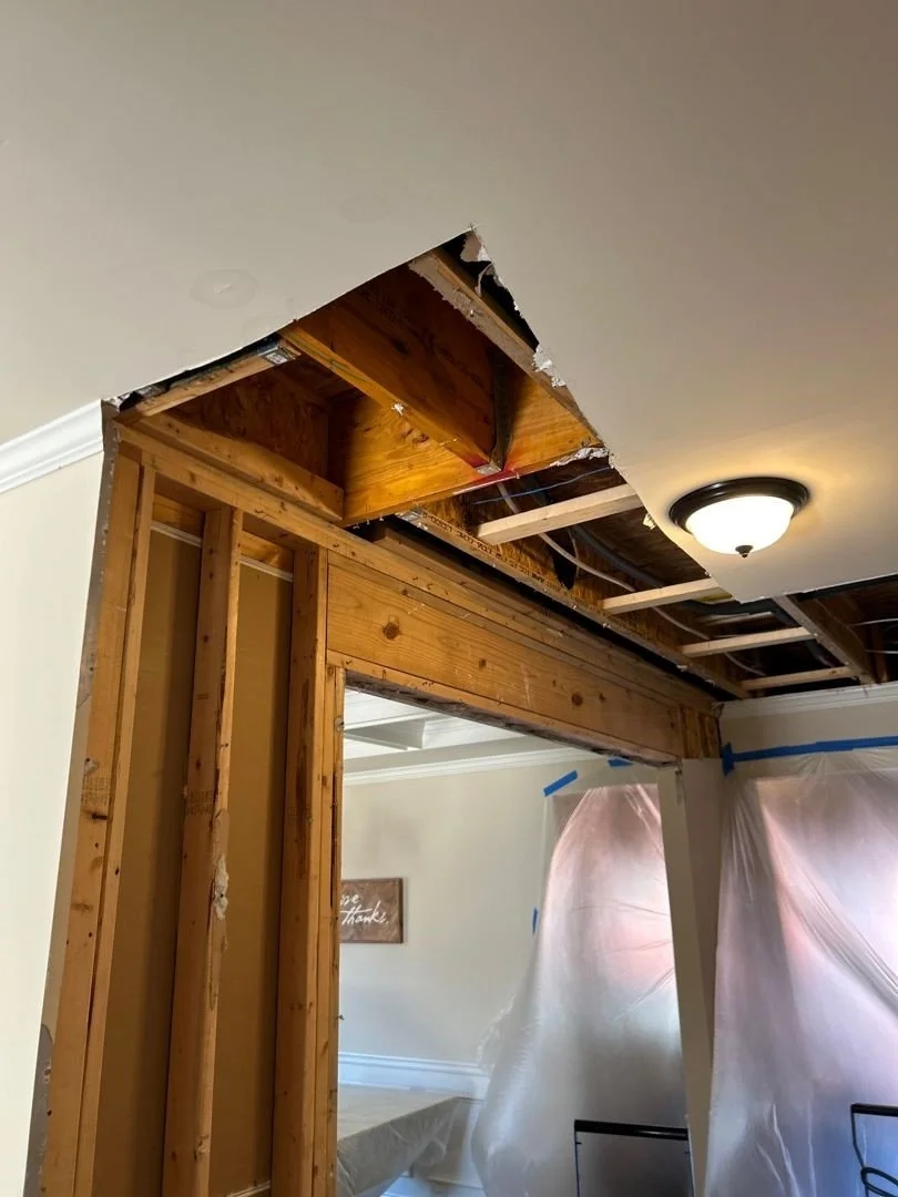 ServiceMaster removed wet drywall on wall and ceiling of Hallway