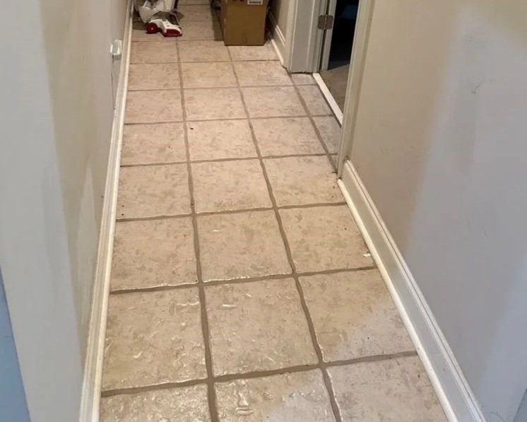 Wet hallway after front loading washer door opened during wash cycle