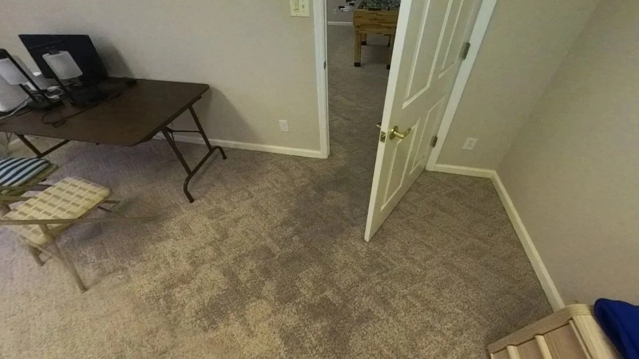 Saturated carpet in a bedroom from a burst water heater