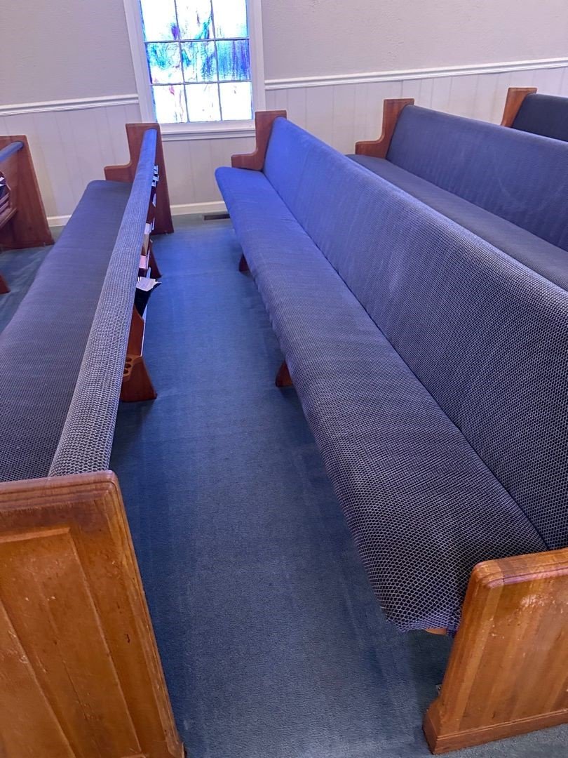 Clean carpet and pews after ServiceMaster carpet and upholstery cleaning