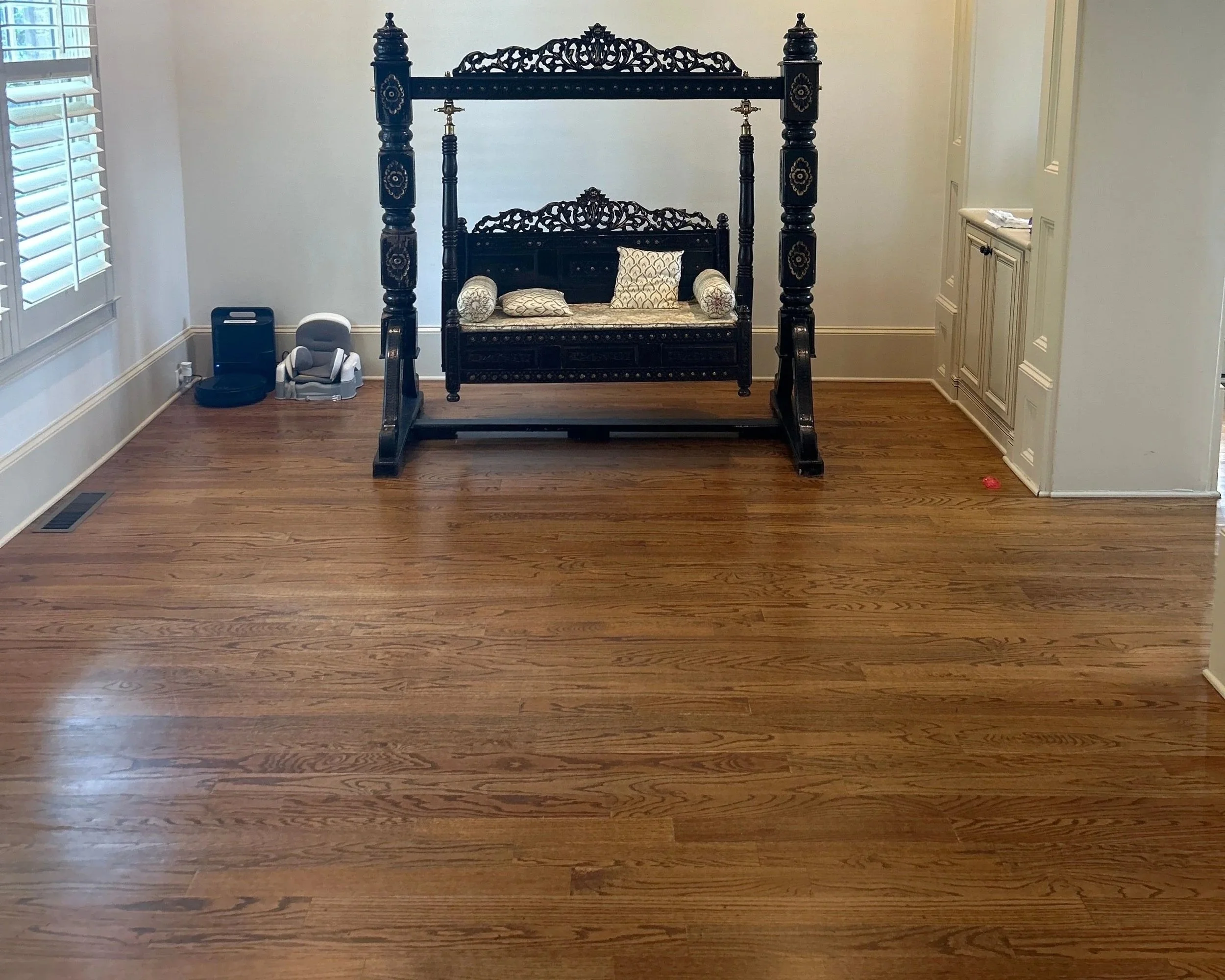 Den walls and floor after ServiceMaster water damage restoration completed