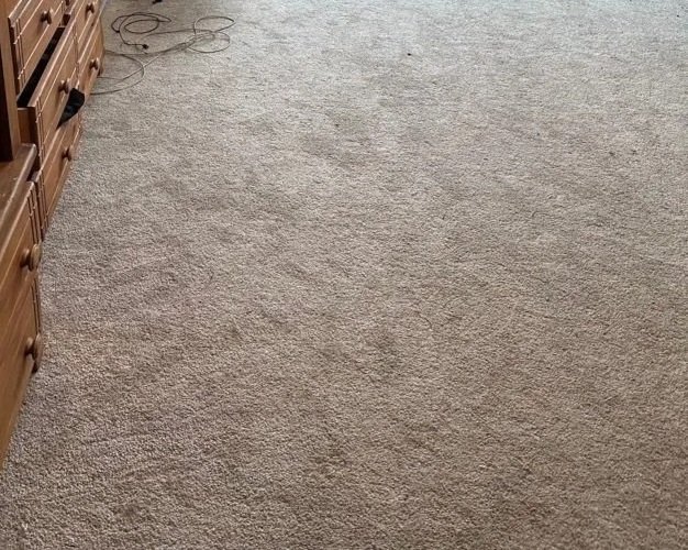 Bedroom carpet before ServiceMaster carpet cleaning