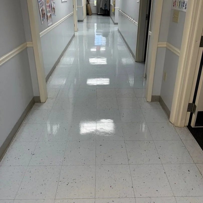 Hallway VCT flooring after ServiceMaster maintenance cleaning