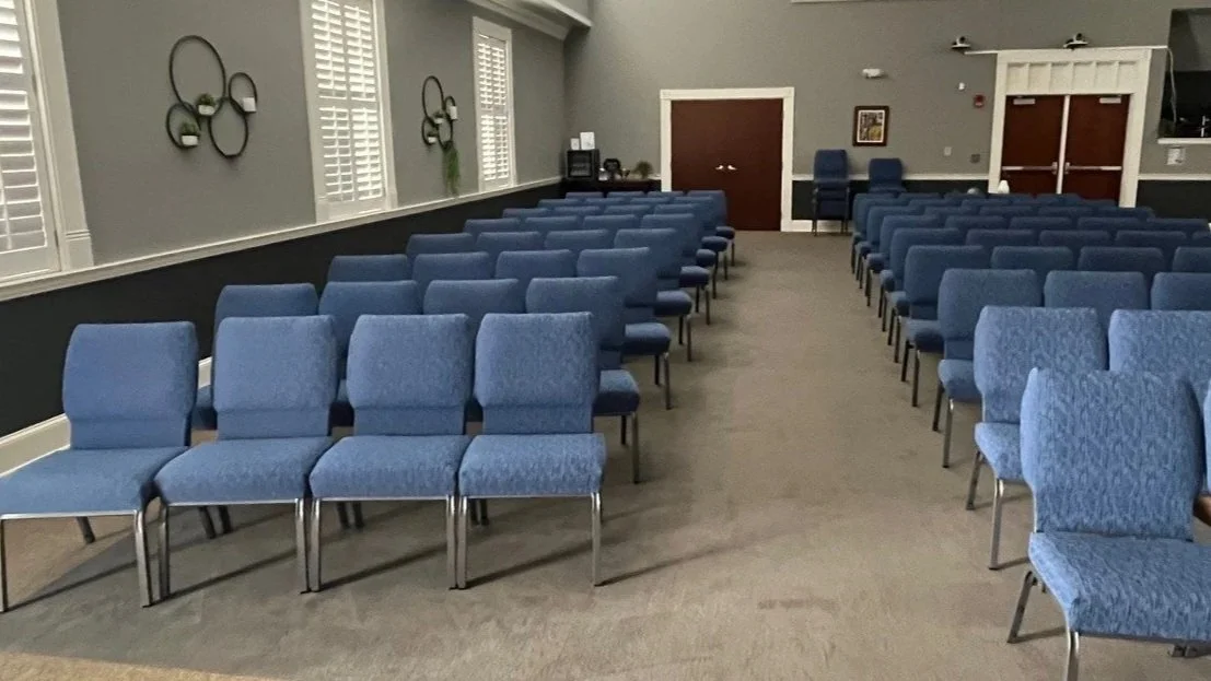 Fellowship hall carpet before ServiceMaster carpet cleaning