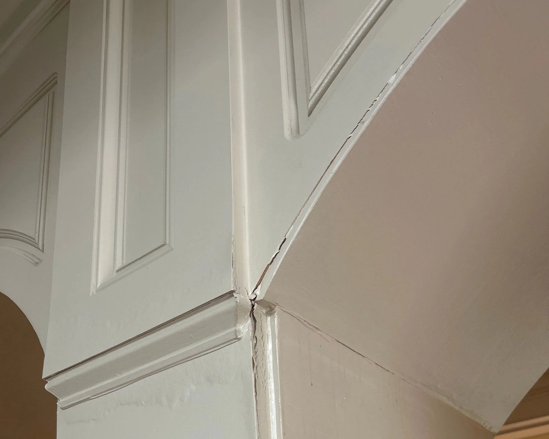 Living room arch trim after 2nd floor bathtub overflowed