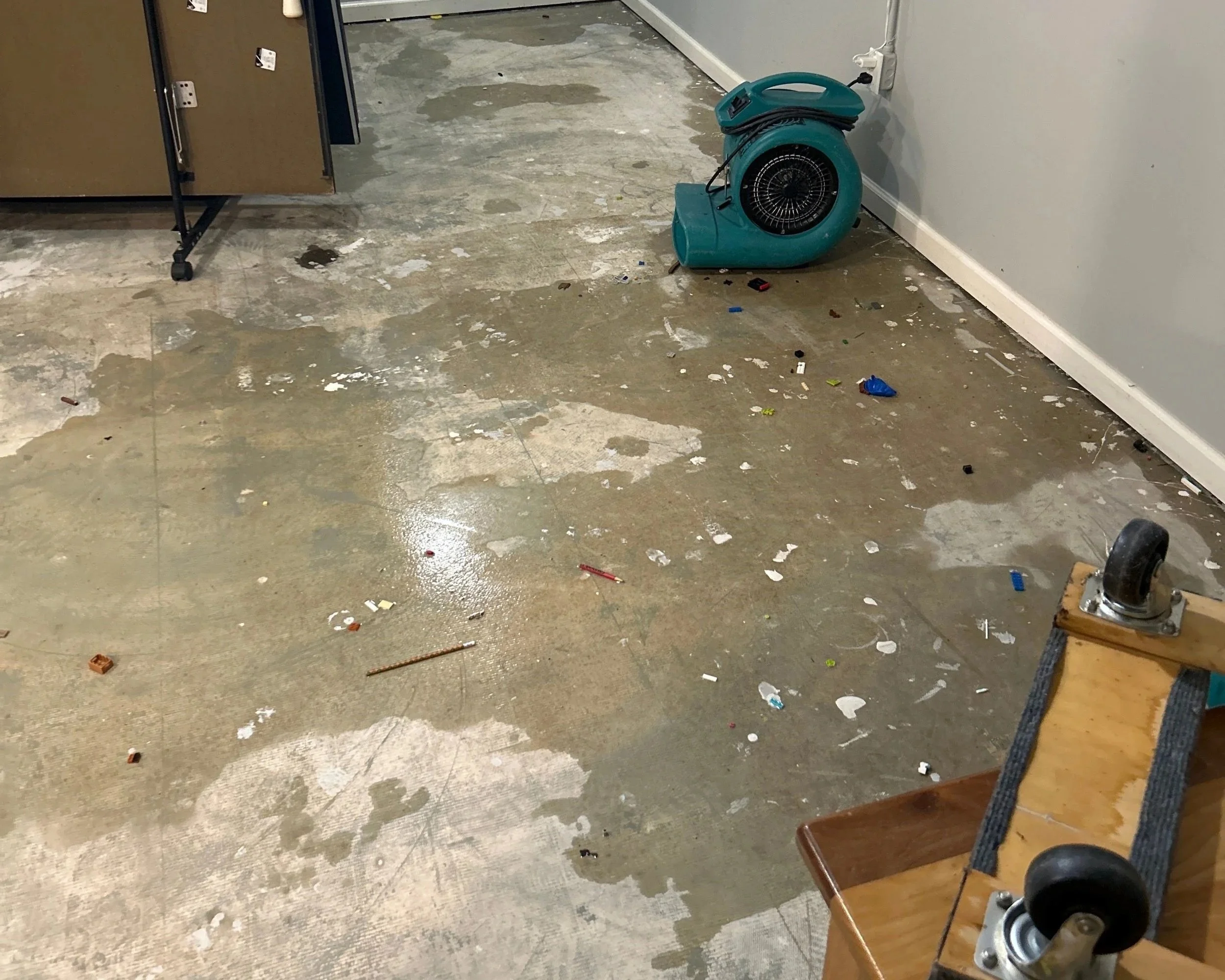 ServiceMaster extracted water from the office, removed the damaged flooring and set drying equipment