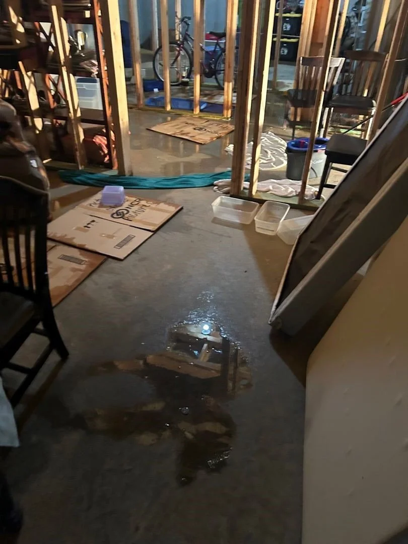 Water on floor of basement after water heater leak