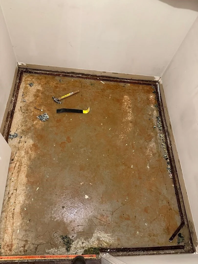 ServiceMaster removed damaged carpet to dry the subfloor