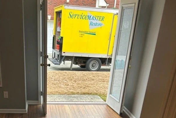 ServiceMaster truck in front of customer home
