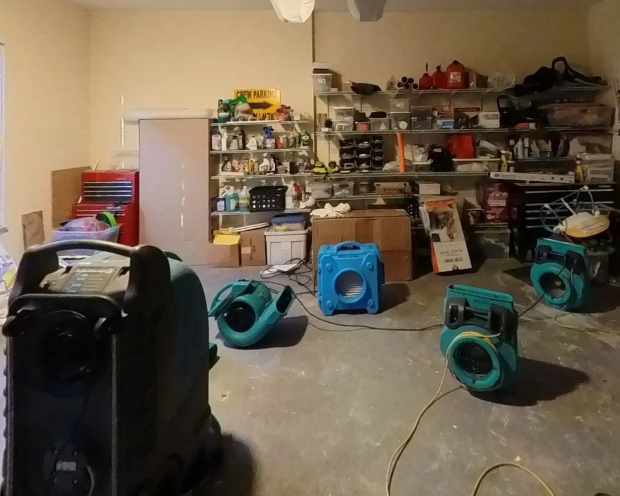 ServiceMaster set drying equipment to dry out garage ceiling