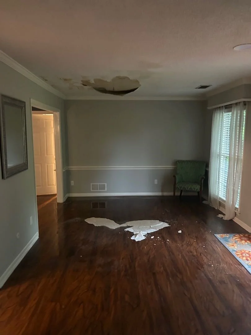 Ceiling fell after water damage affected this living room
