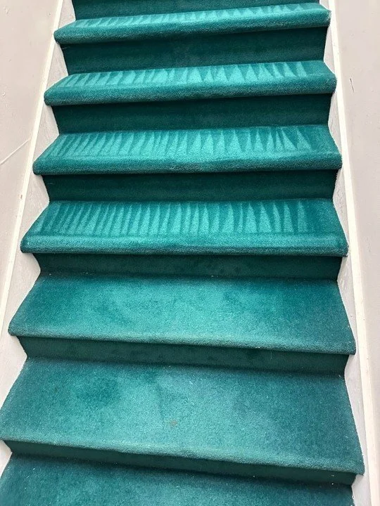 ServiceMaster cleaning of carpeted staircase