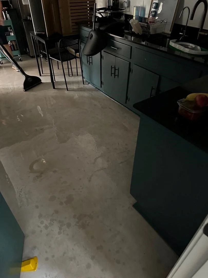 ServiceMaster extracting water from the Break Room