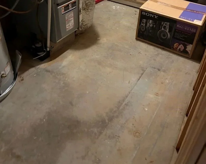 Utility room floor after ServiceMaster water damage mitigation completed