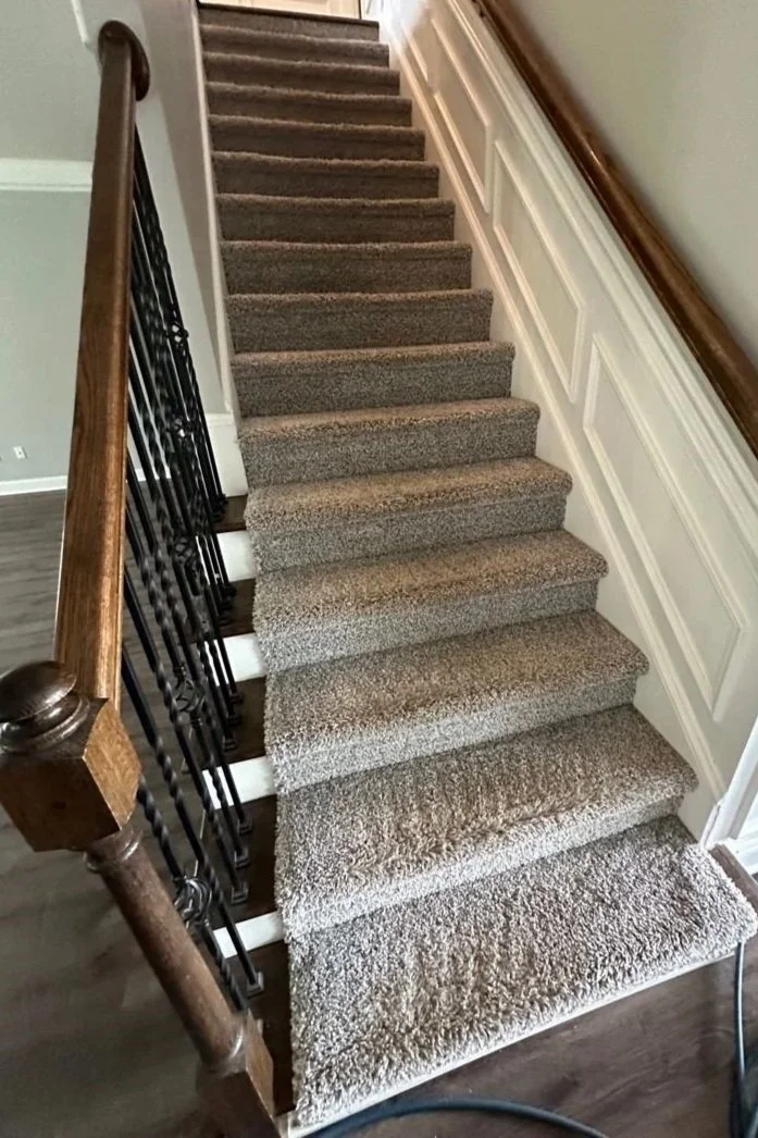 Looking up staircase after ServiceMaster move out carpet cleaning