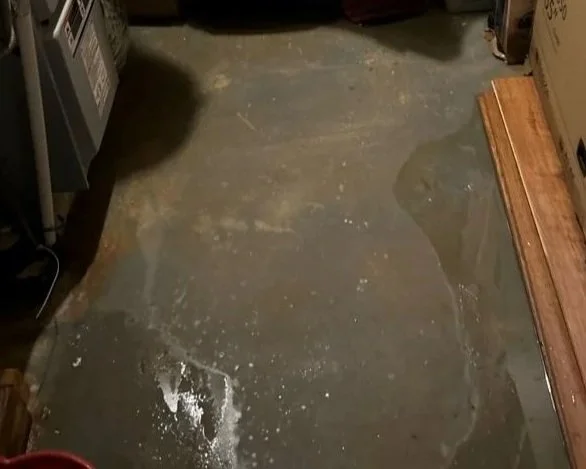 Water on basement floor after water heater burst