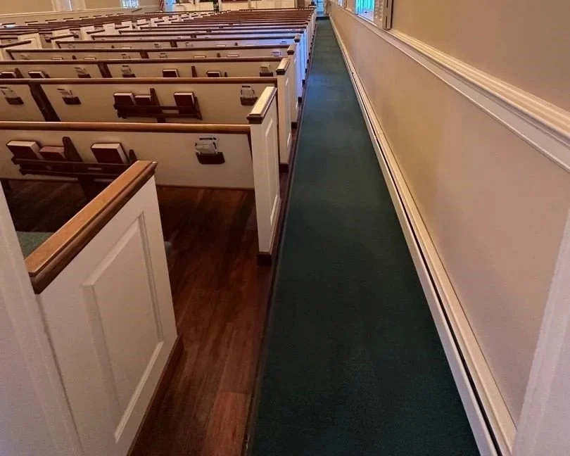 Carpet on the right aisle of the sanctuary after a ServiceMaster professional carpet cleaning