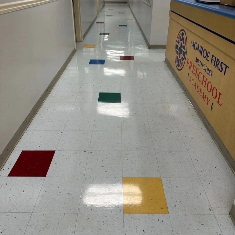 Hallway VCT flooring after ServiceMaster maintenance floor cleaning
