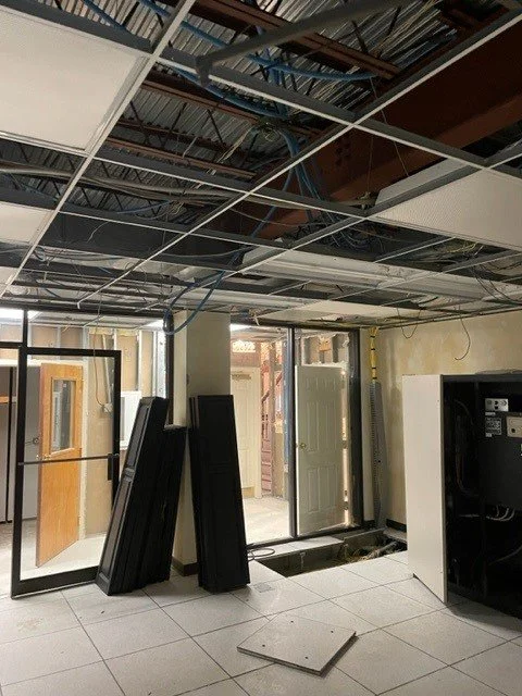 Mechanical room after ServiceMaster removed the wet ceiling tiles, cleaned up and dried out the room