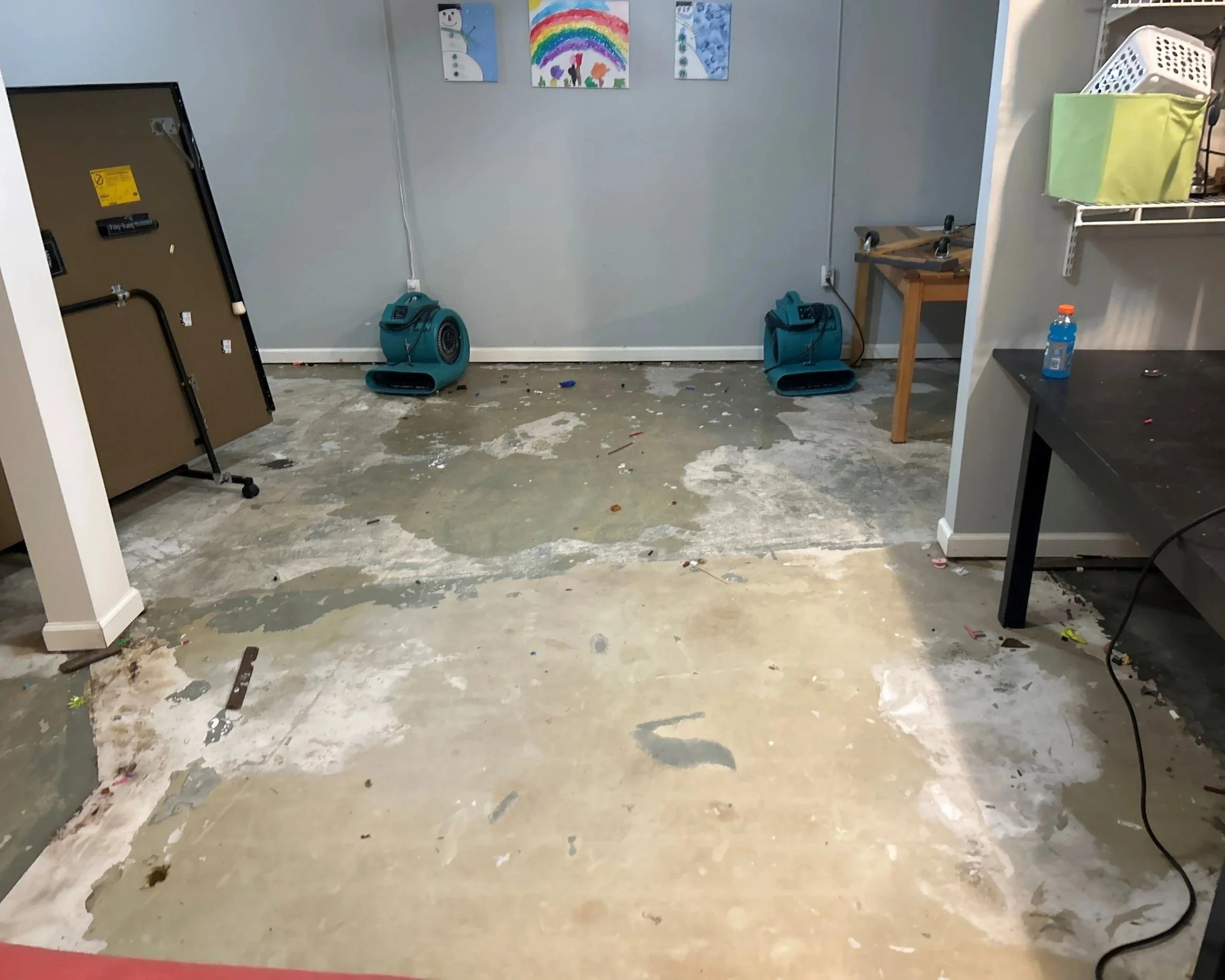 ServiceMaster extracted water from the office, removed the damaged flooring and set drying equipment