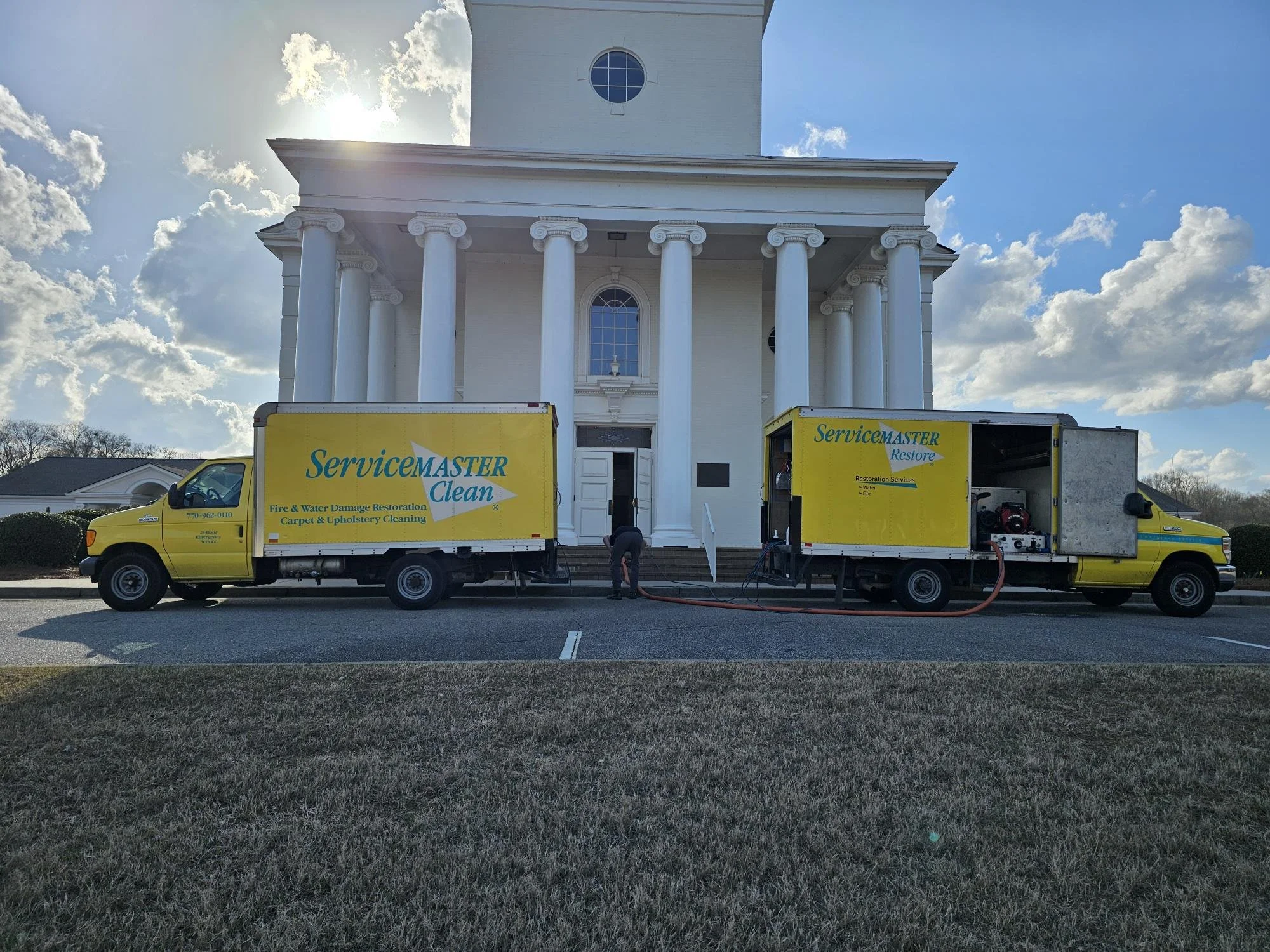 ServiceMaster cleaning trucks in front of Bethlehem First UMC
