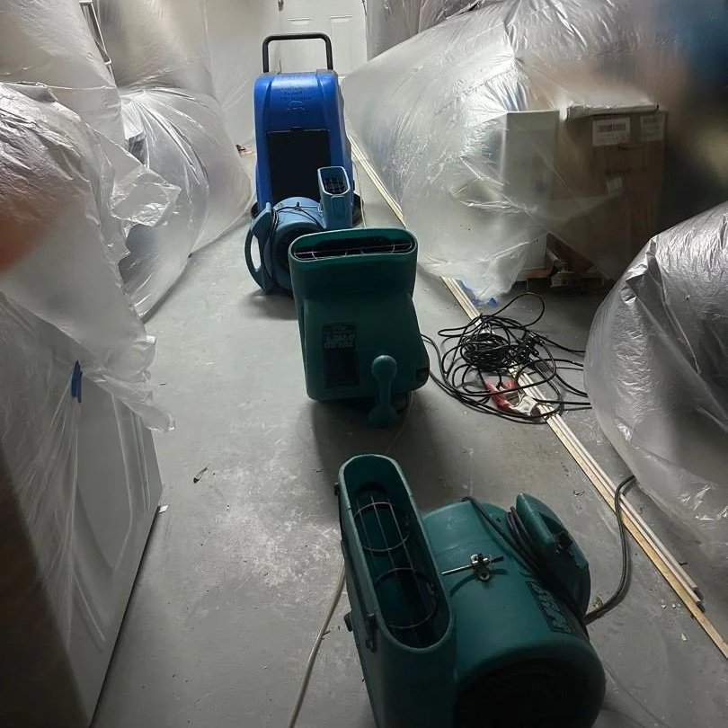 Equipment drying garage with plastic still in place to protect the contents