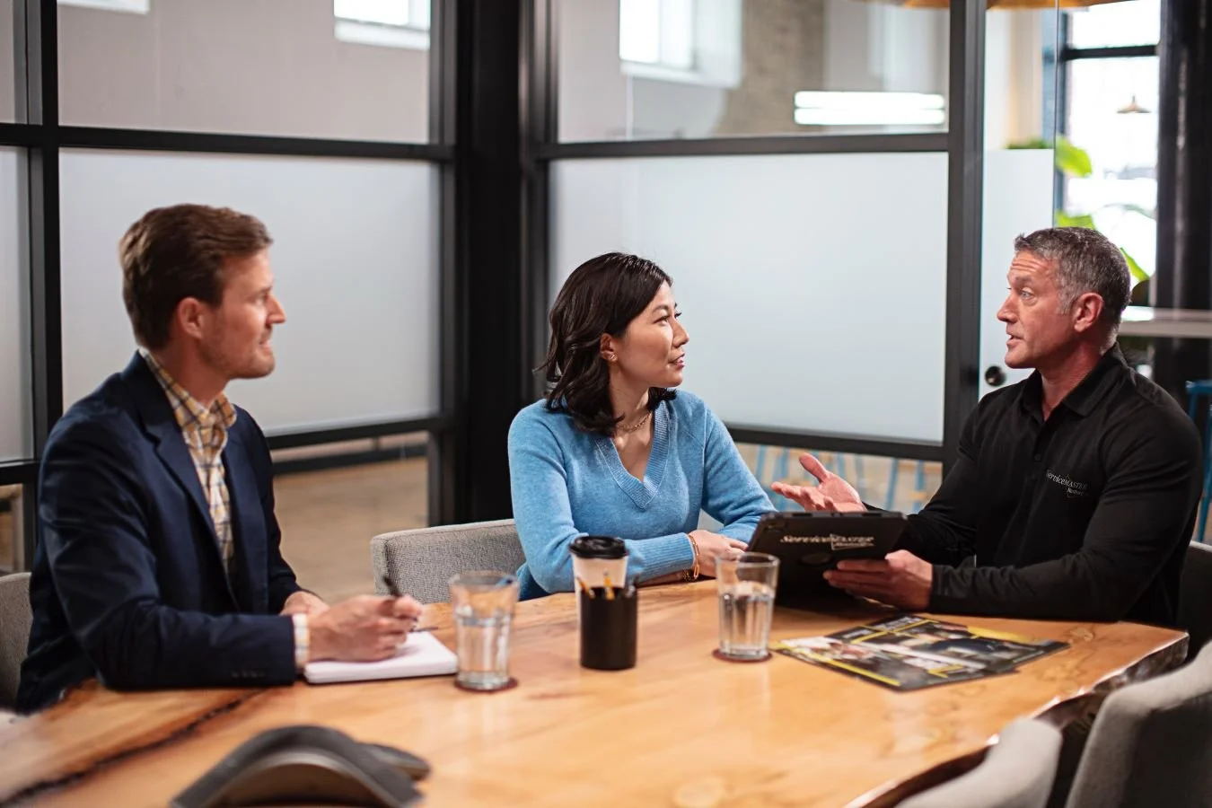 ServiceMaster Technician Meeting with Customer and Insurance Agent.JPG