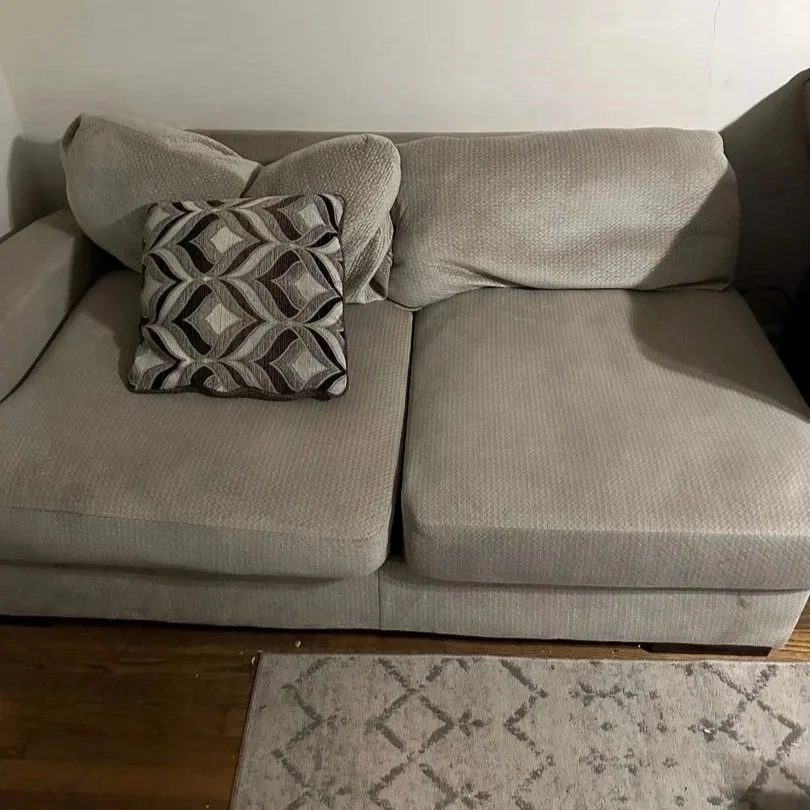 Sofa before ServiceMaster upholstery deep cleaning