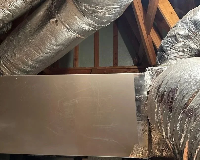 Attic HVAC unit that leaked affecting the bathroom below