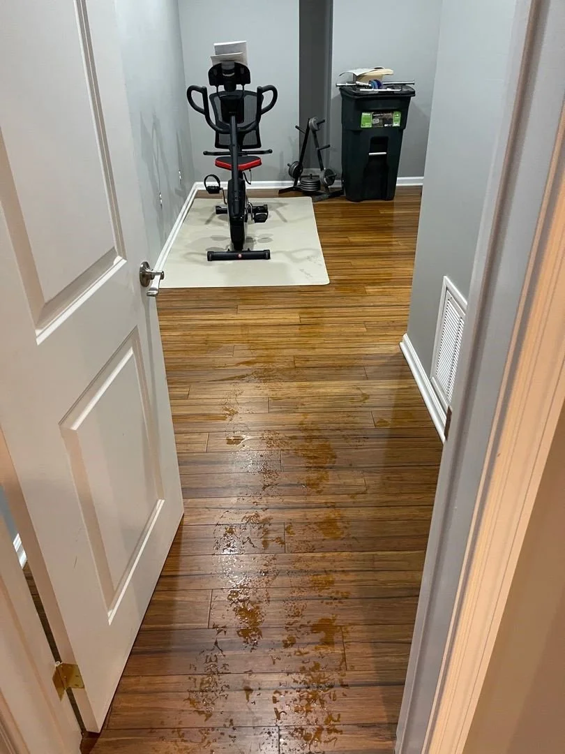 Water on Gym floor and walls after water loss