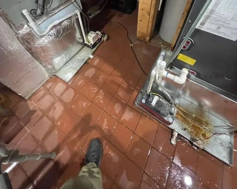 Water in utility room after expansion tank on water heater burst