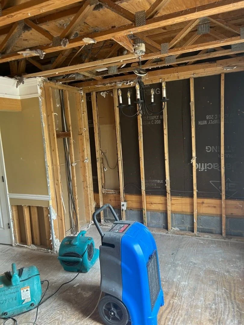 ServiceMaster removed the affected drywall and flooring then set equipment to dry the room