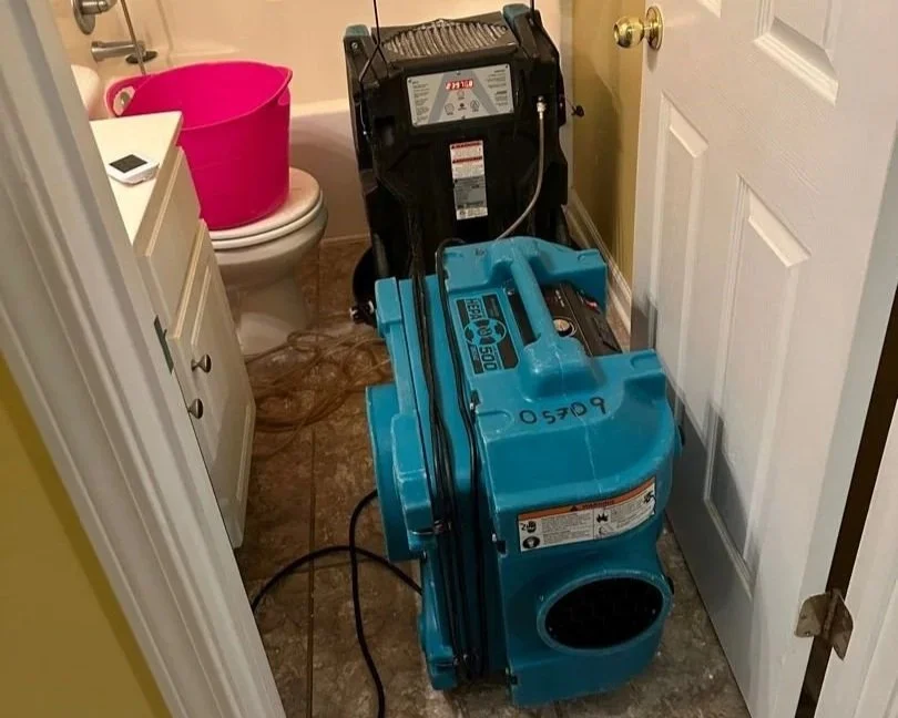 ServiceMaster set equipment to dry the affected bathroom