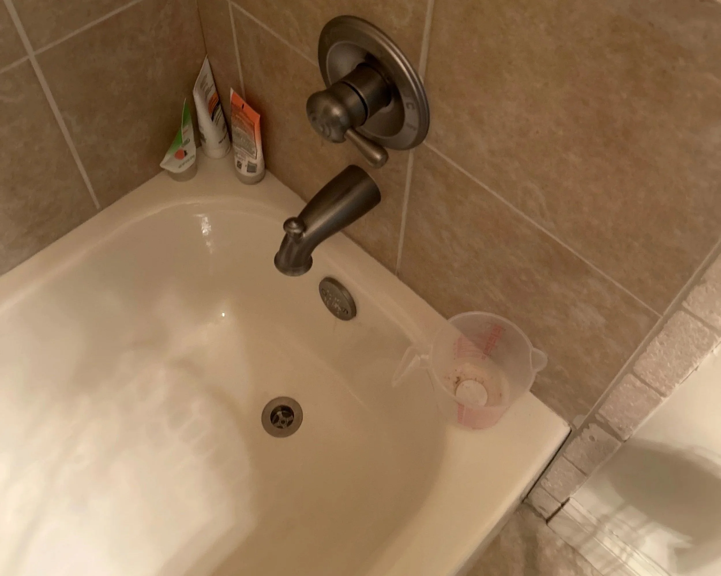A bathtub that overflowed causing water damage to this home